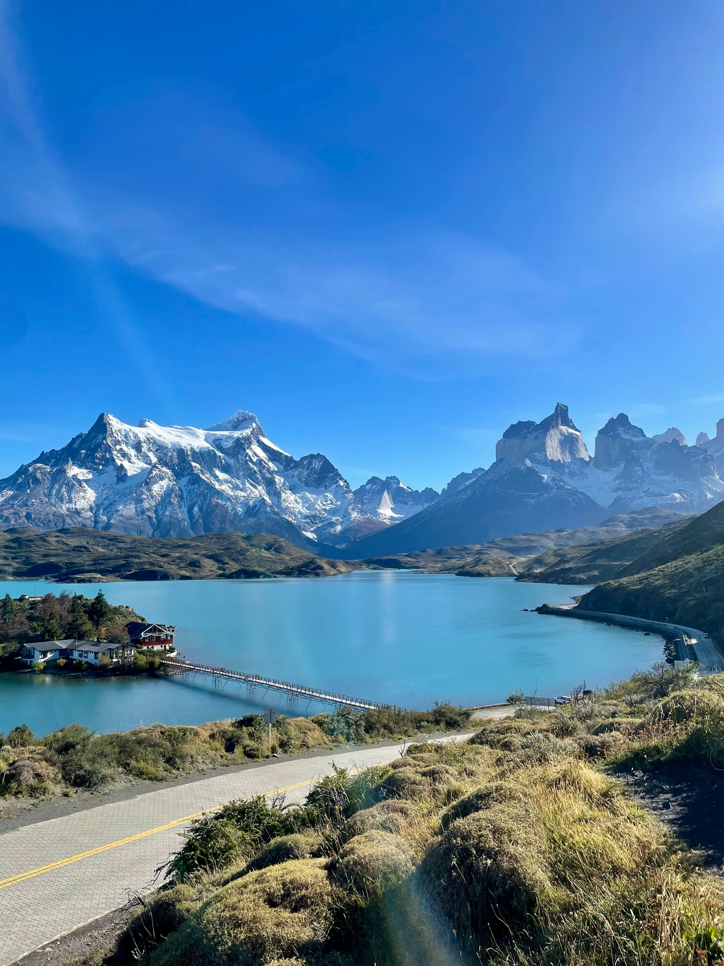 a scenic view of a lake and mountains