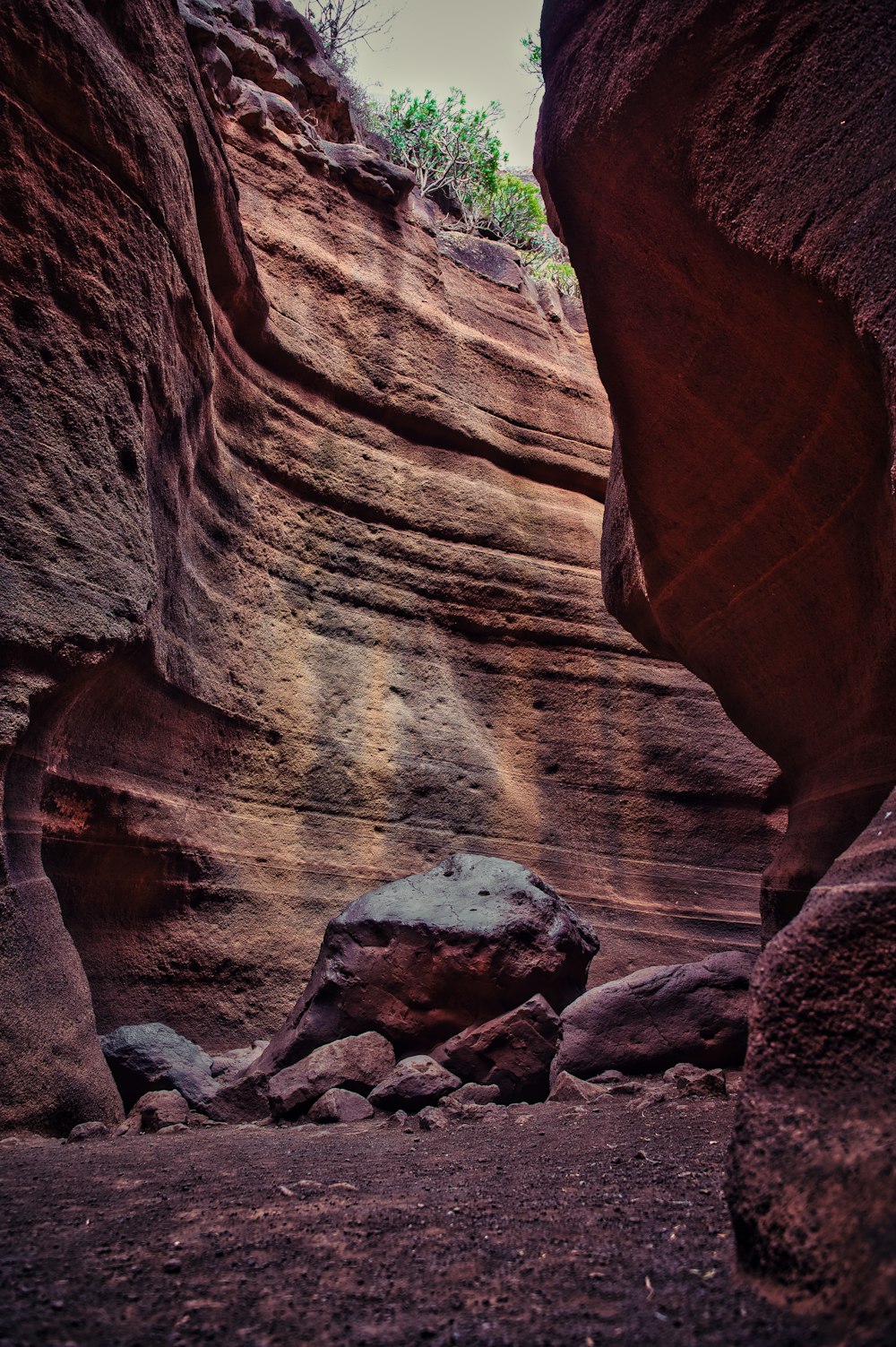 a narrow slot in the side of a mountain