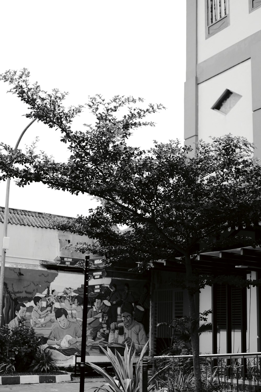 a black and white photo of a clock tower