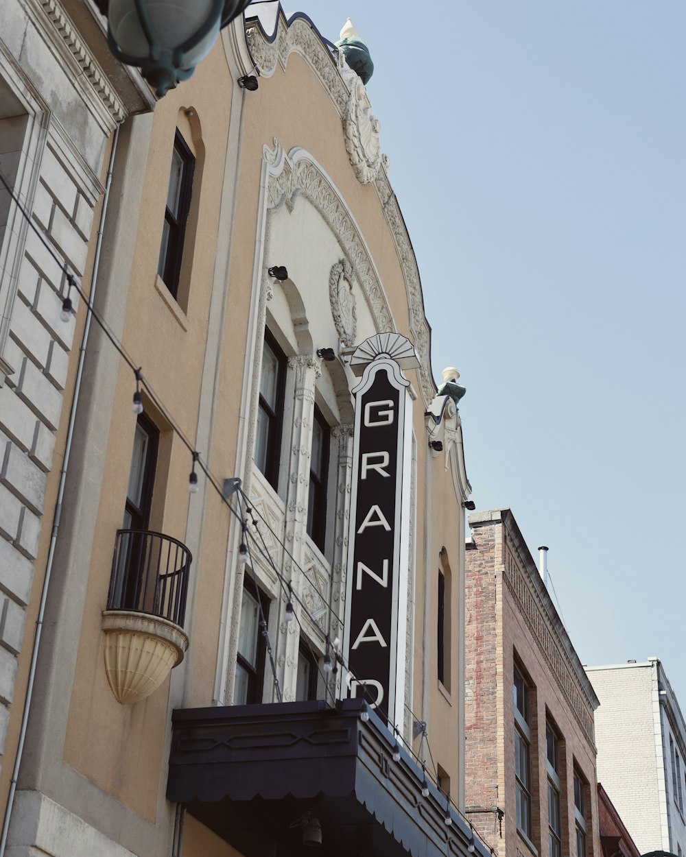 the marquee on the side of the building reads grana