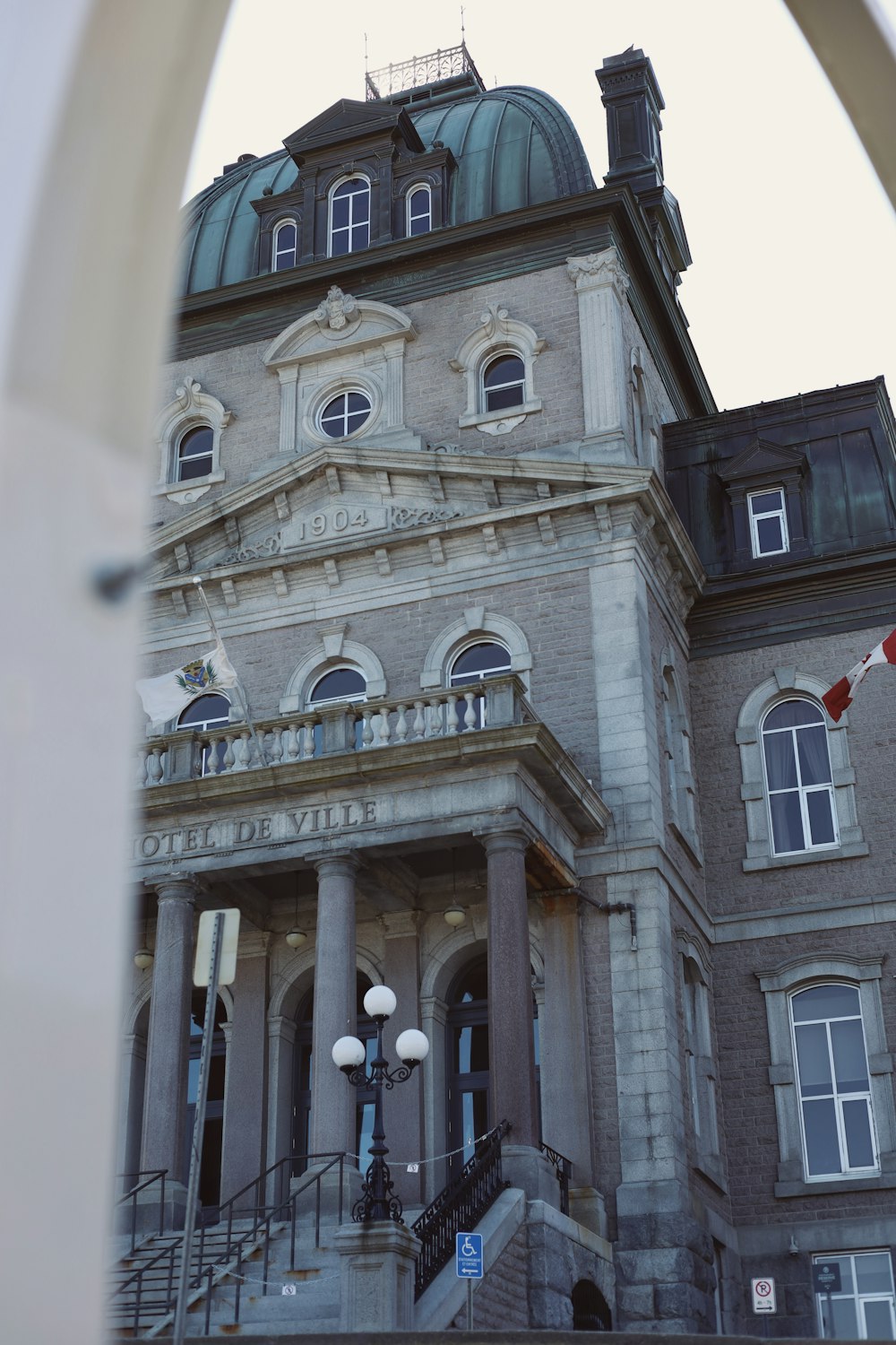 a large building with a clock on the top of it