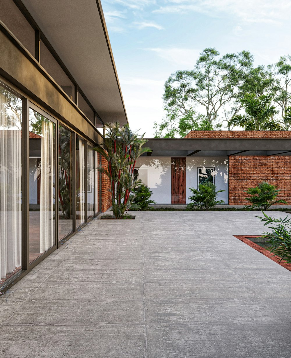 a house with a lot of windows and plants