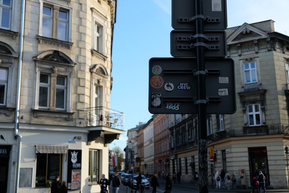 a street sign on a pole in front of a building