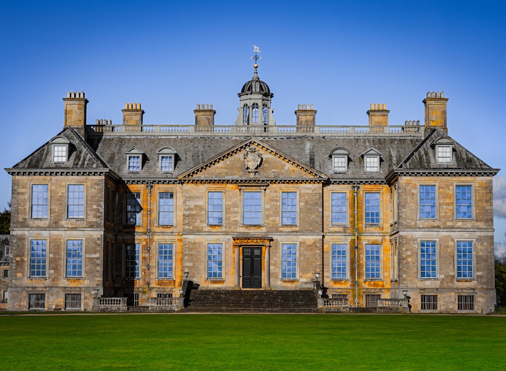 a large building with a clock on the front of it