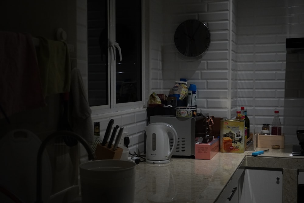 a kitchen counter with a blender and a blender on it