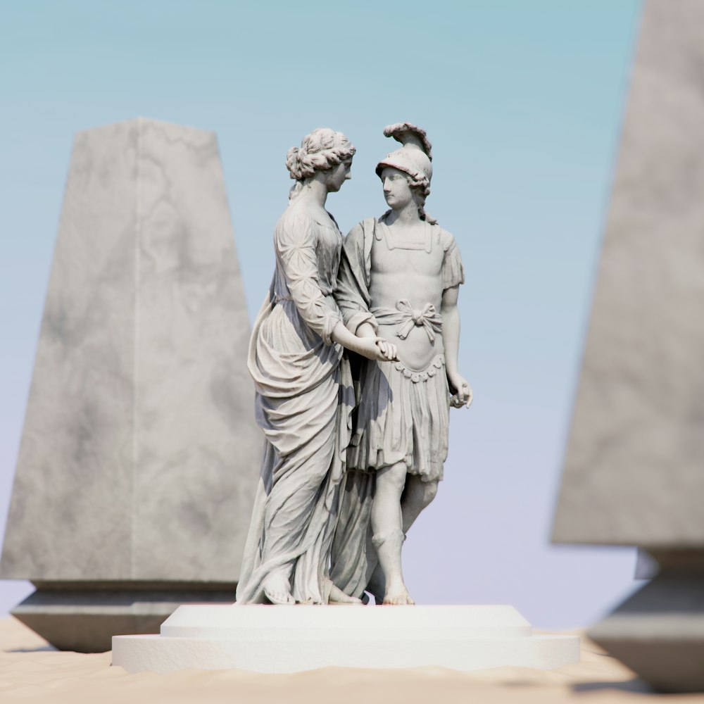 eine Statue von zwei Menschen, die nebeneinander stehen