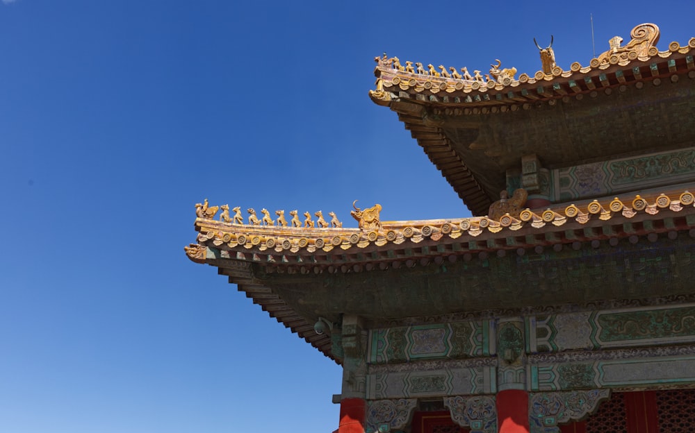 a tall building with a sky in the background