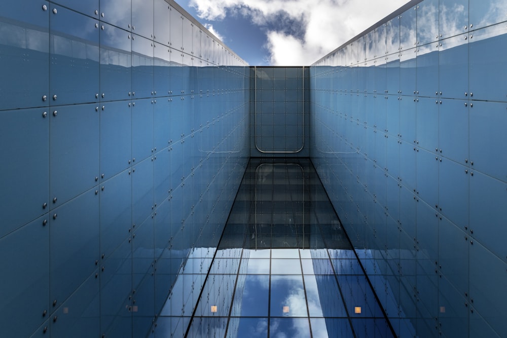 a very tall building with a sky in the background