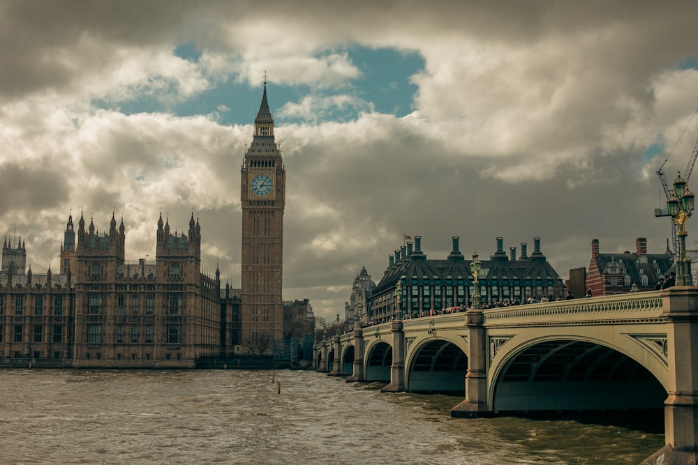 a large clock tower towering over a city