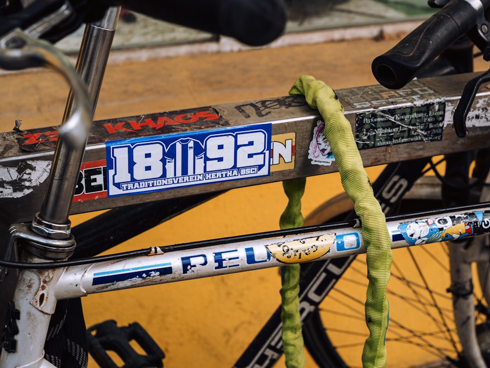 a close up of a bike with a rope attached to it