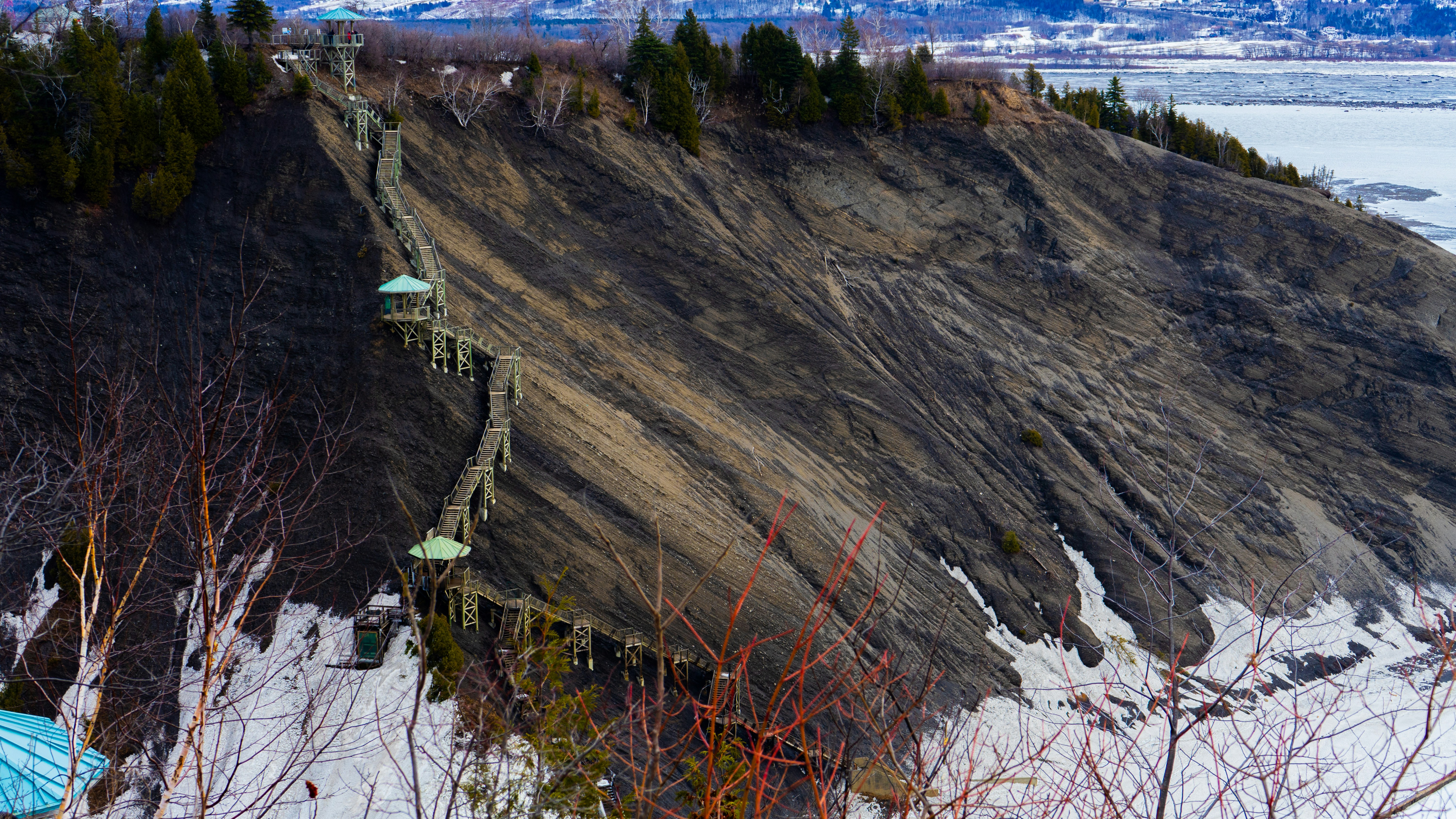 a view of a mountain with a bridge going over it