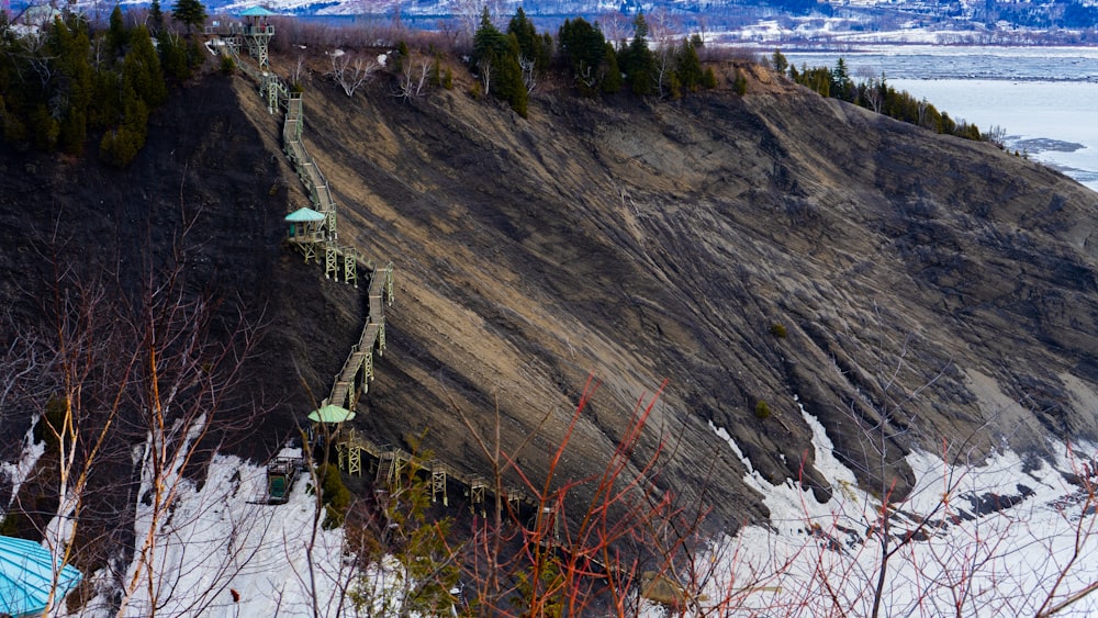 a view of a mountain with a bridge going over it