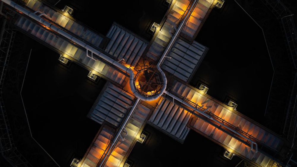 an aerial view of a train station at night