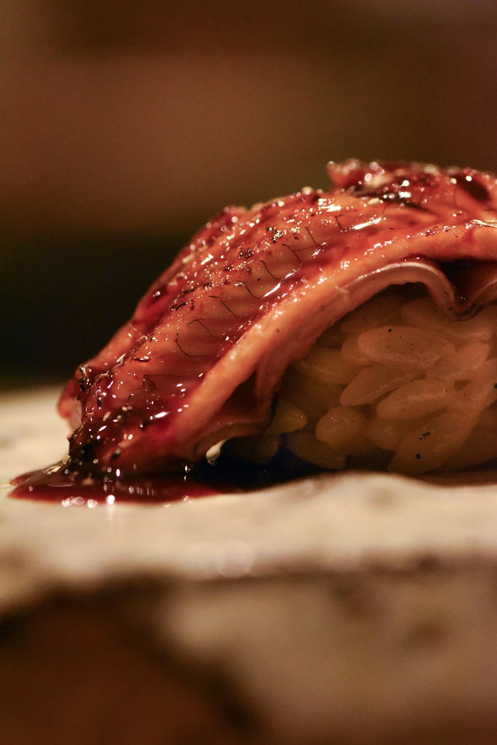 a close up of a piece of food on a table