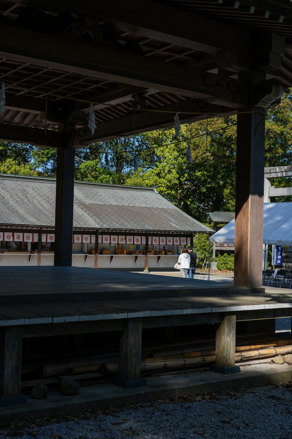 a train station with a train on the tracks