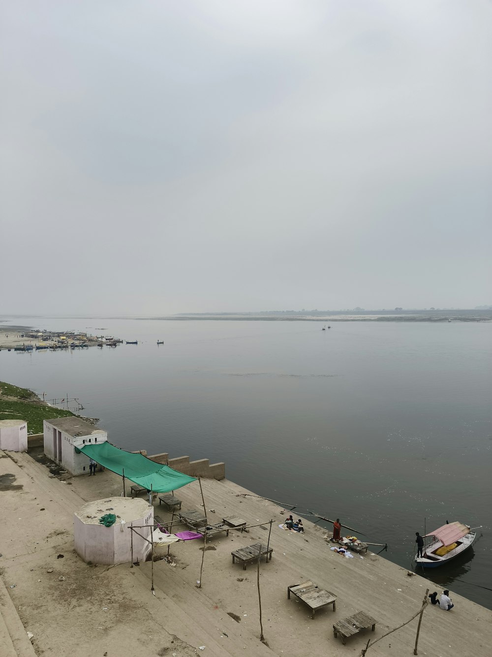 a body of water with a boat docked at the end of it