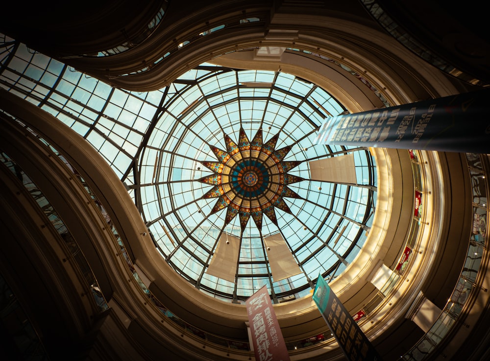 a view from the top of a building looking up at the ceiling