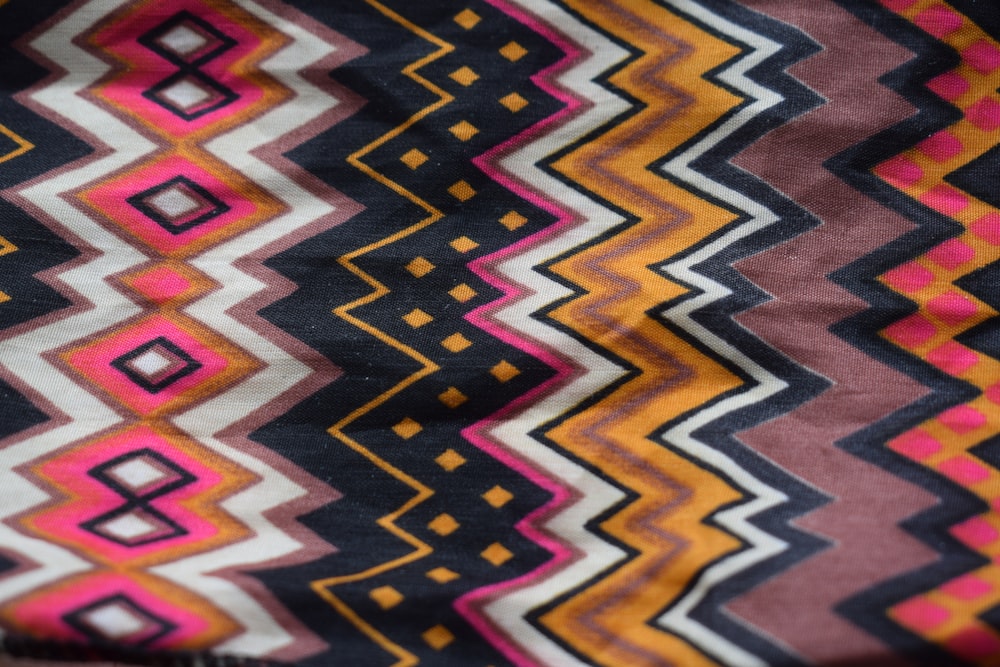 a close up of a blanket with a pattern on it