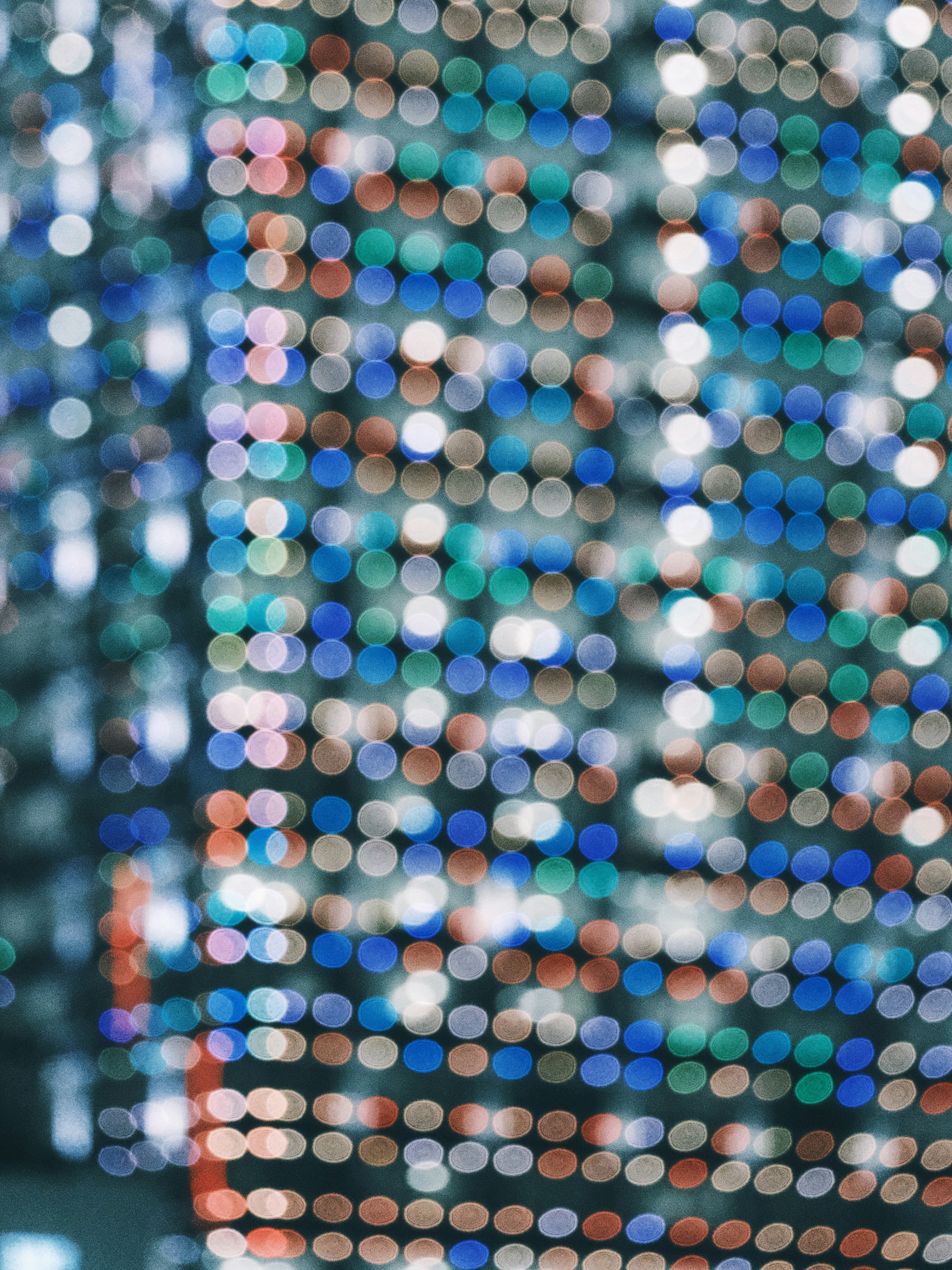 a blurry photo of a city with lots of lights