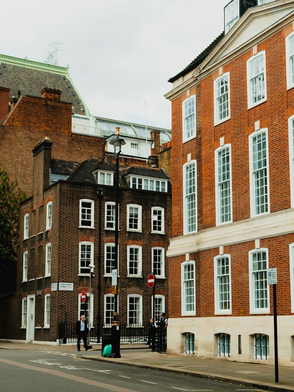 a red brick building on a city street