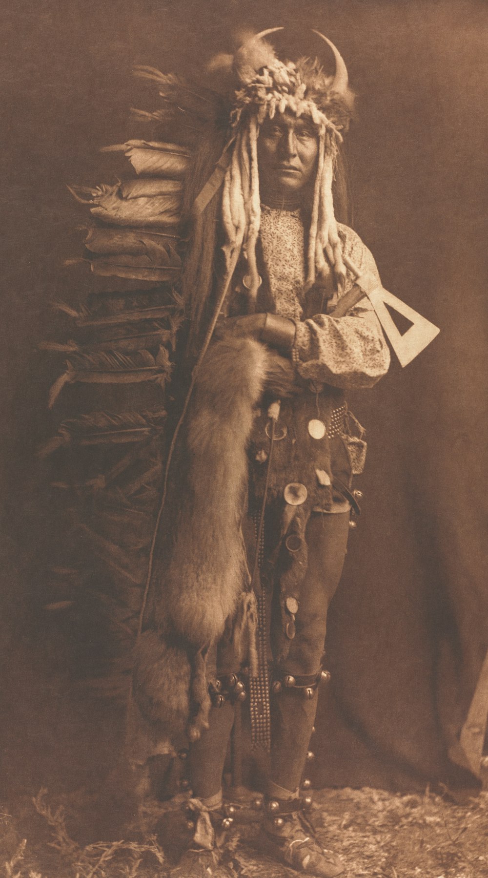 an old photo of a native american man