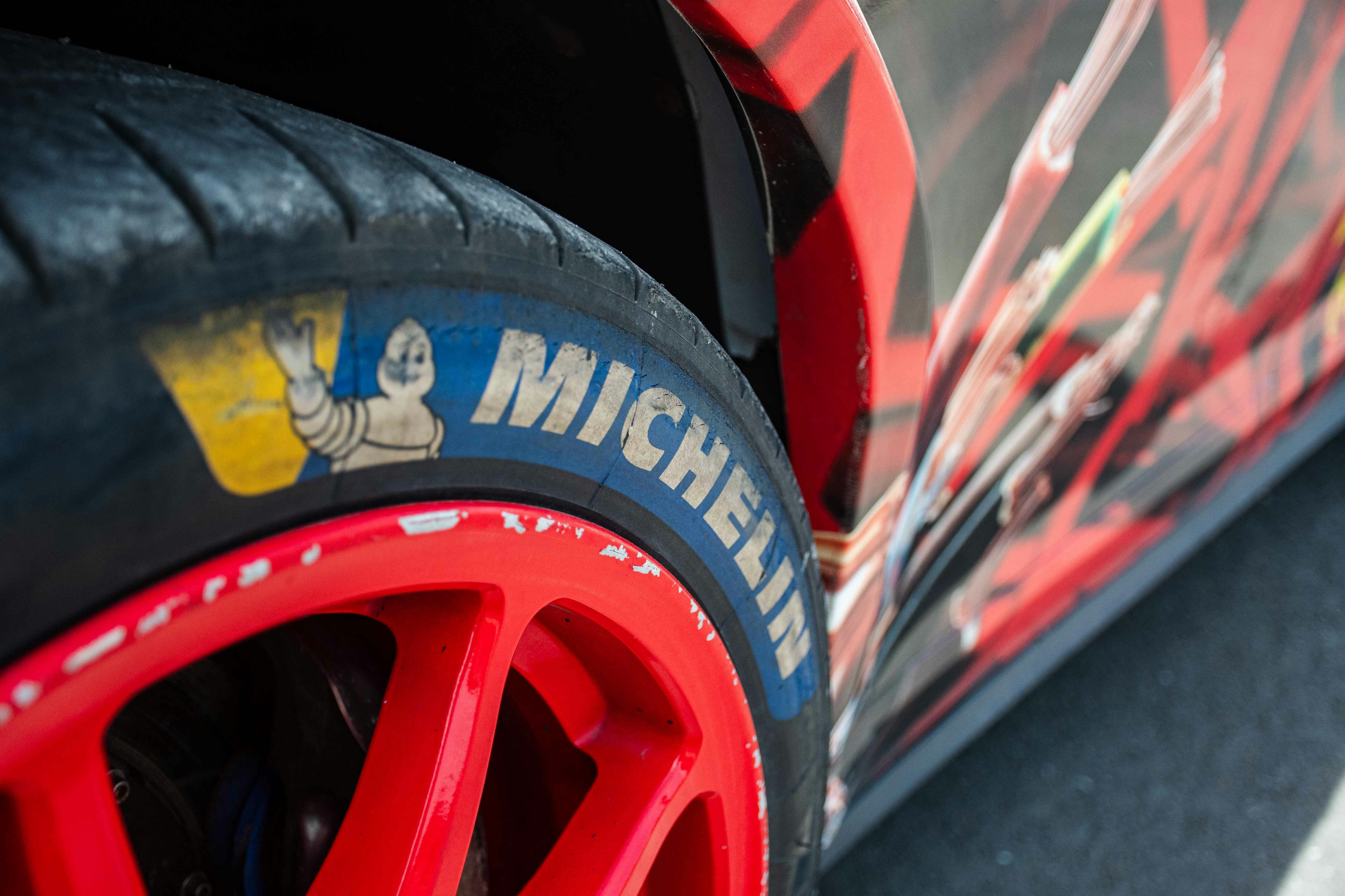 a close up of a tire on a race car