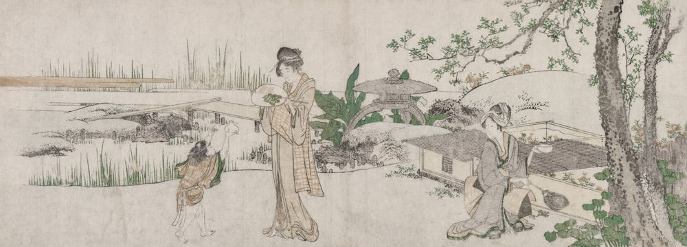 a woman in a kimono standing next to a tree