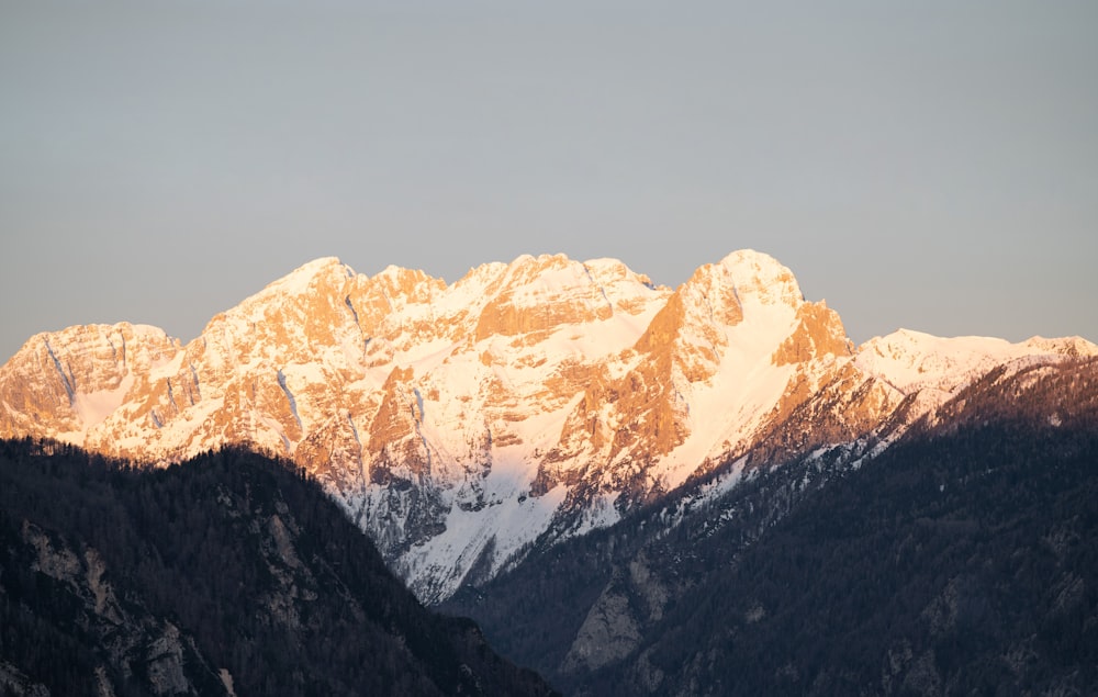 a view of a mountain range at sunset