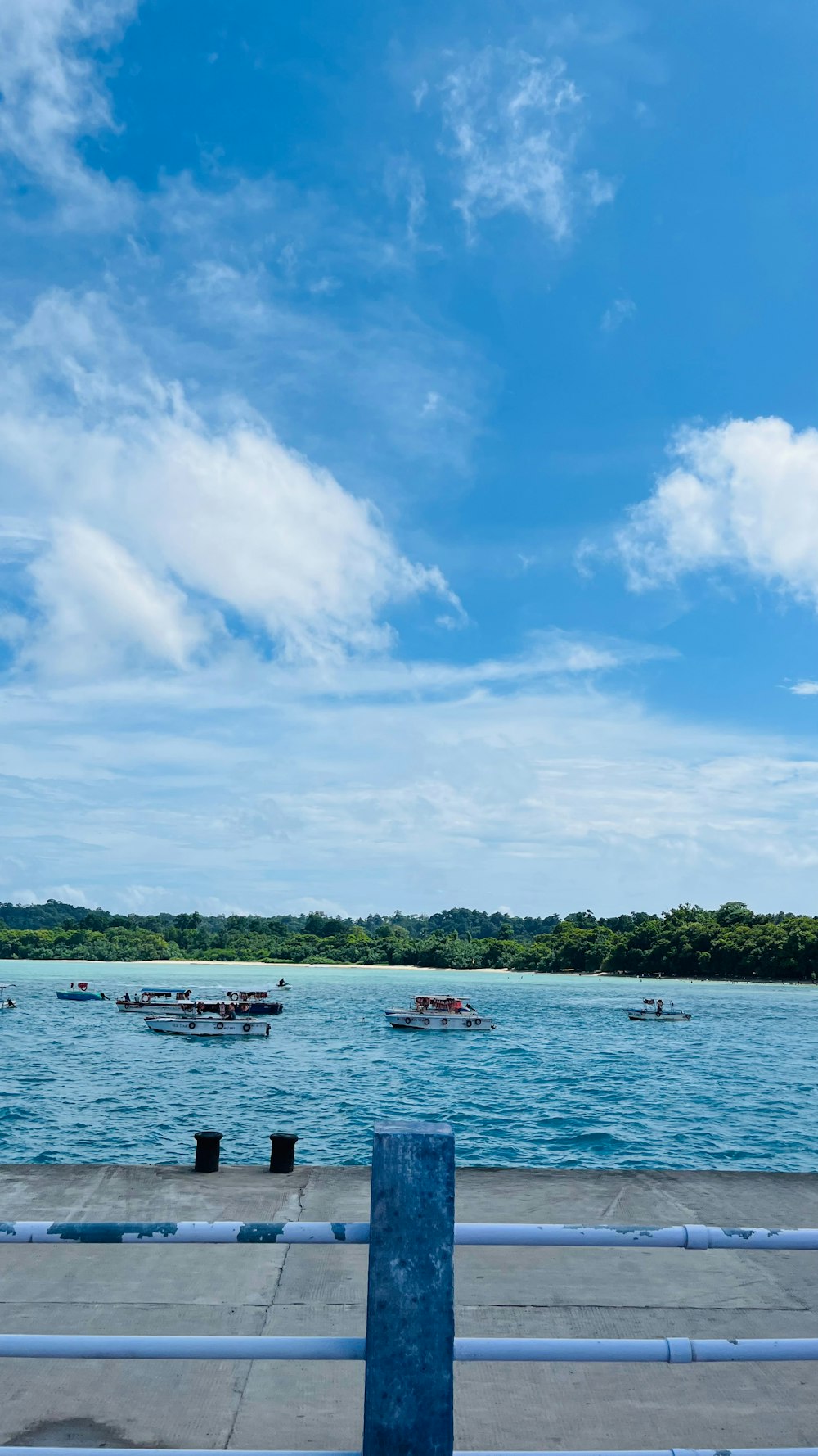 a view of a body of water with boats in it