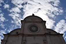 a church steeple with a sky background