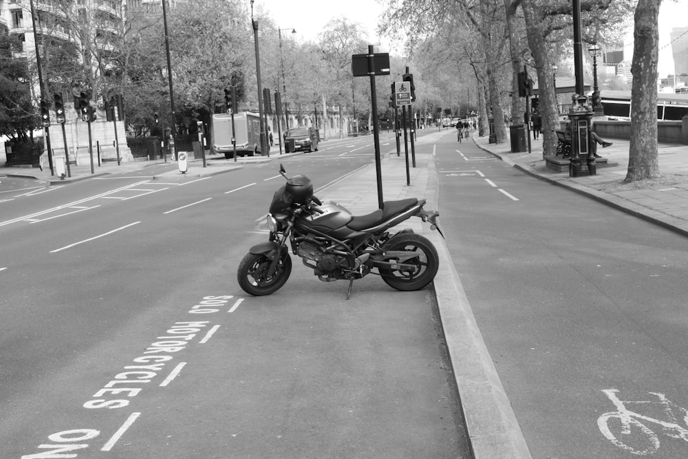 a motorcycle parked on the side of the road