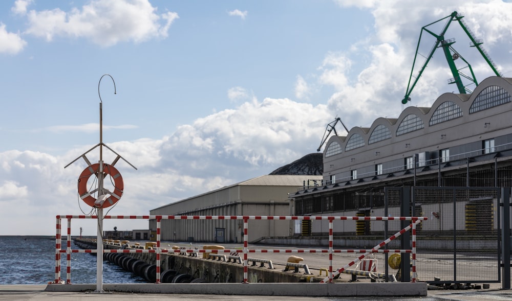 a boat dock with a large building in the background