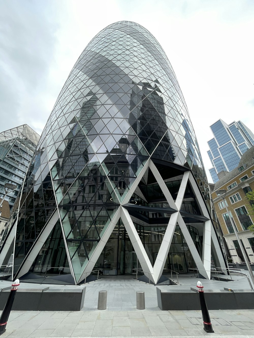 a large glass building with a triangular design