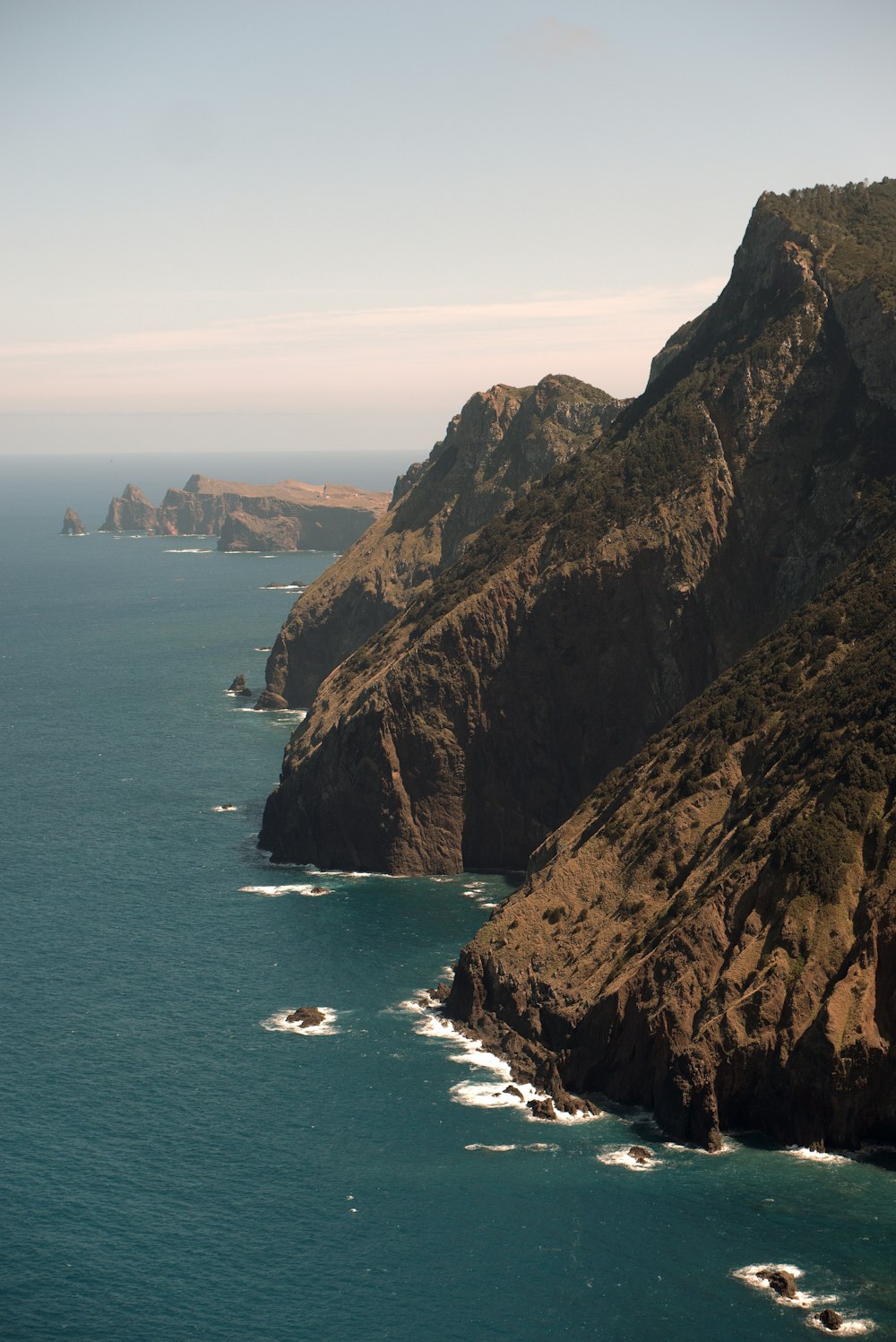 a large body of water surrounded by mountains