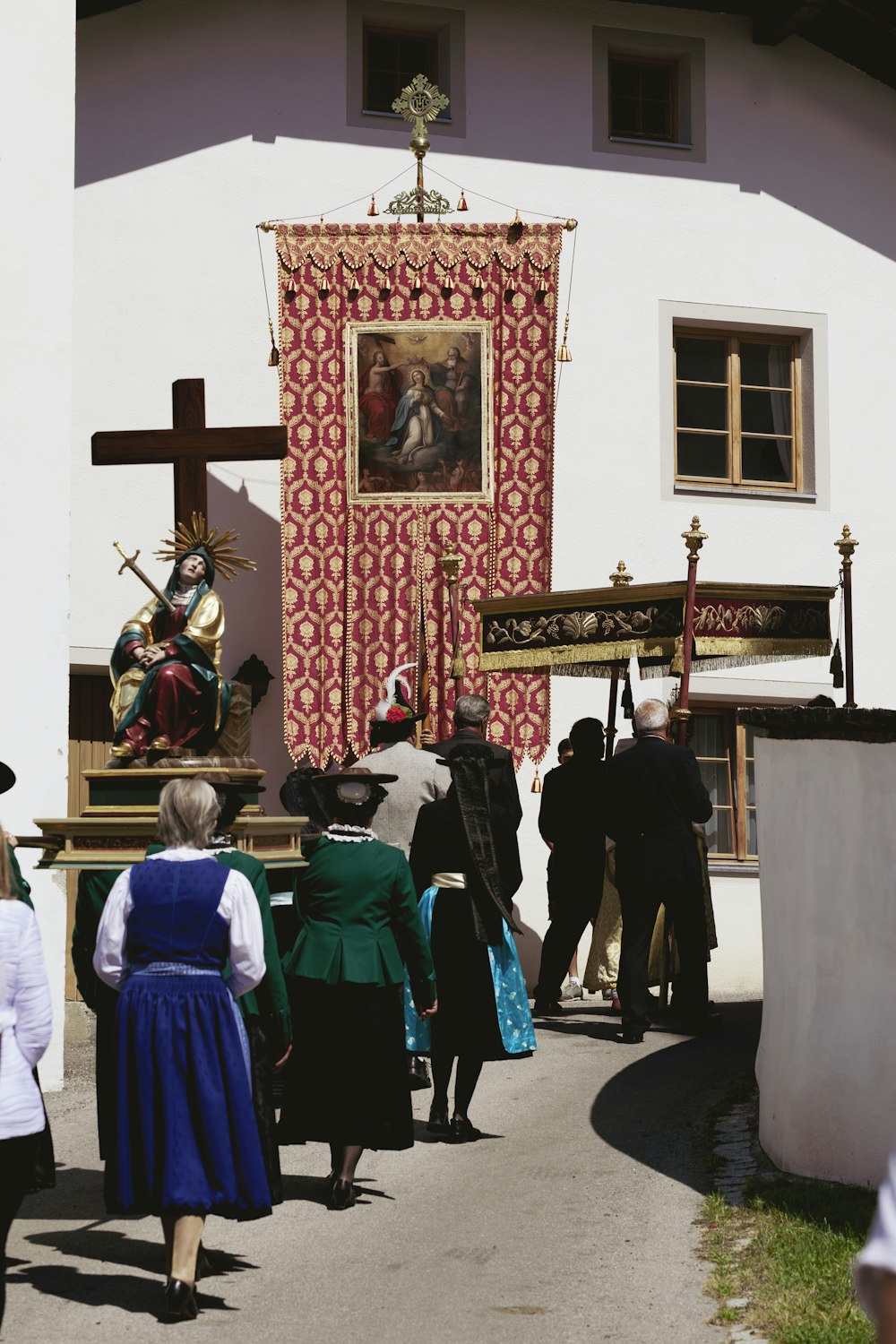 a group of people standing in front of a church