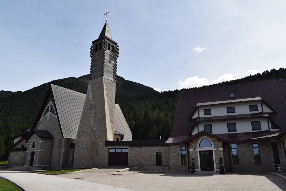 a church with a steeple and a clock tower