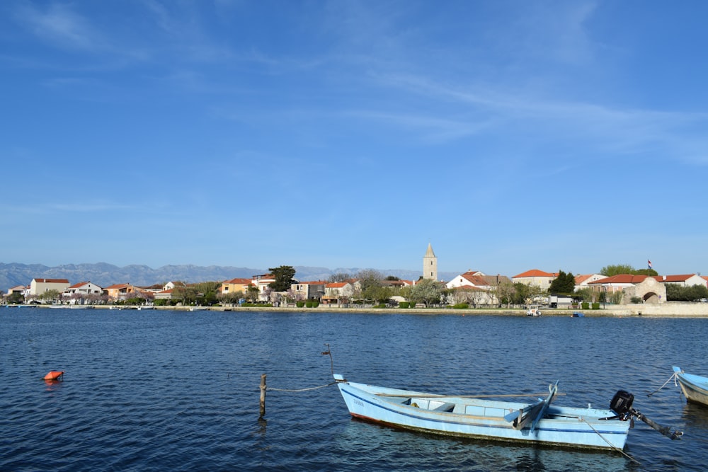 a couple of boats that are sitting in the water