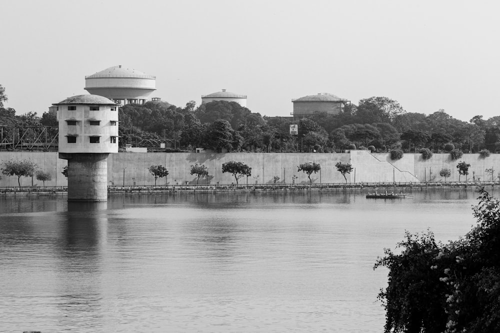 a large body of water with a tower in the middle of it