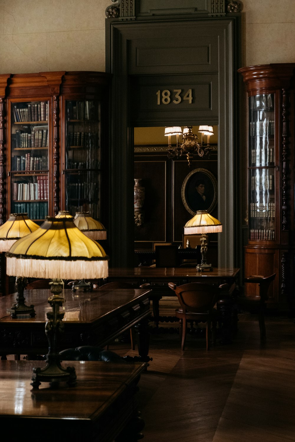 a room with a table and a lamp in it