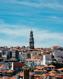 a large clock tower towering over a city