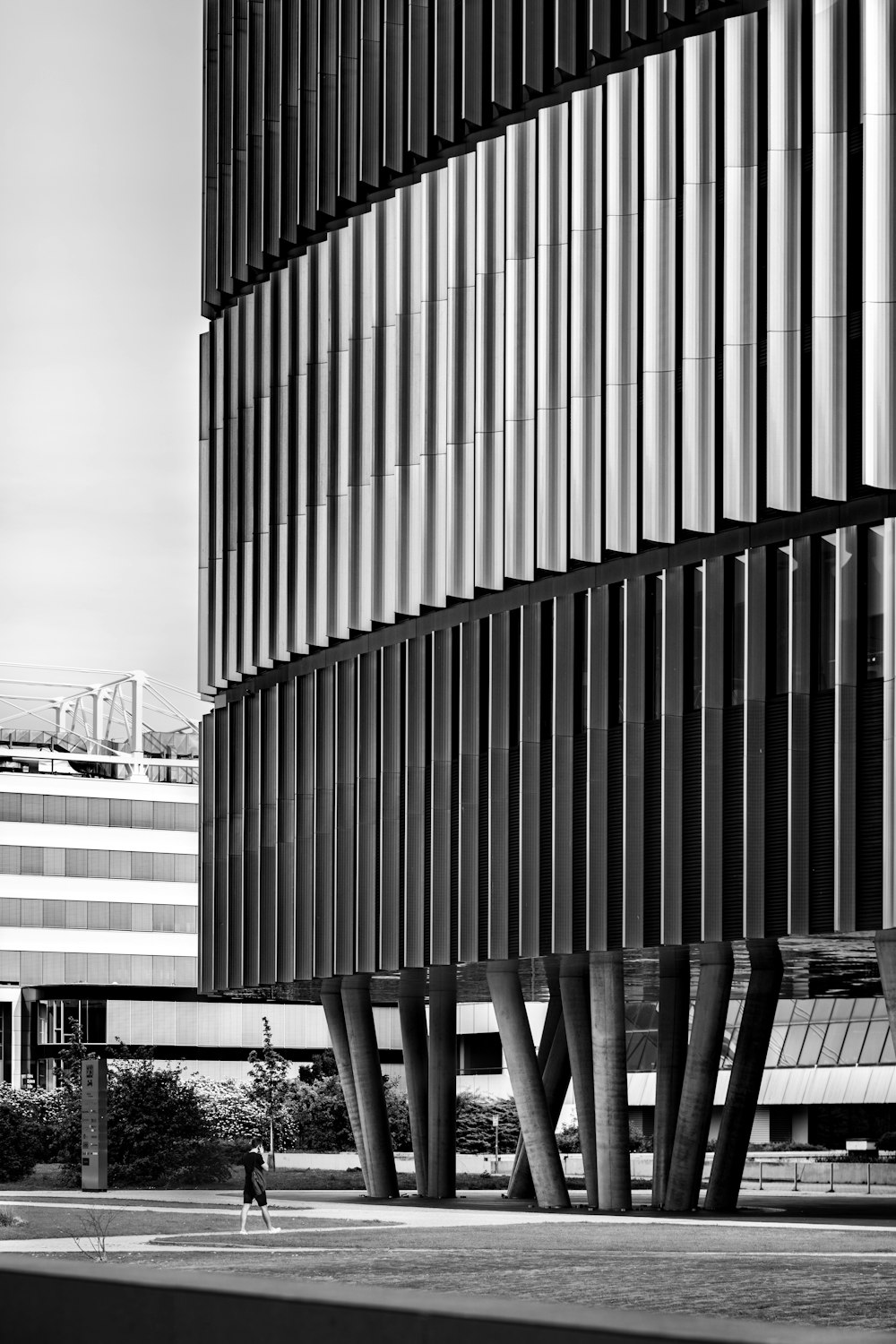 a black and white photo of a tall building