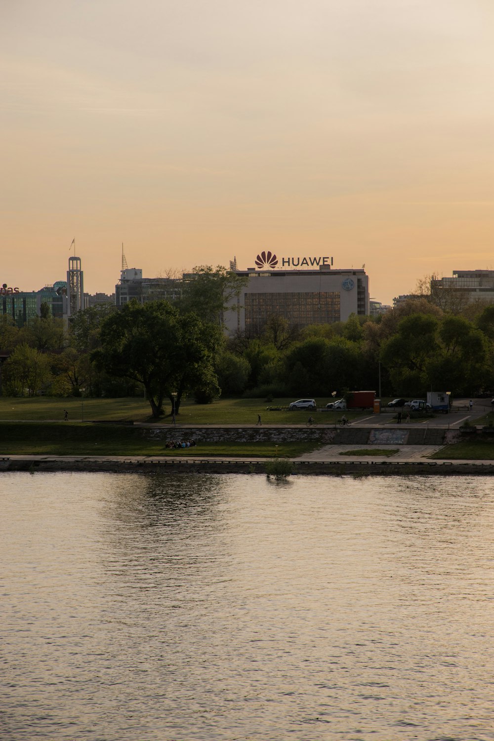 a body of water with a city in the background