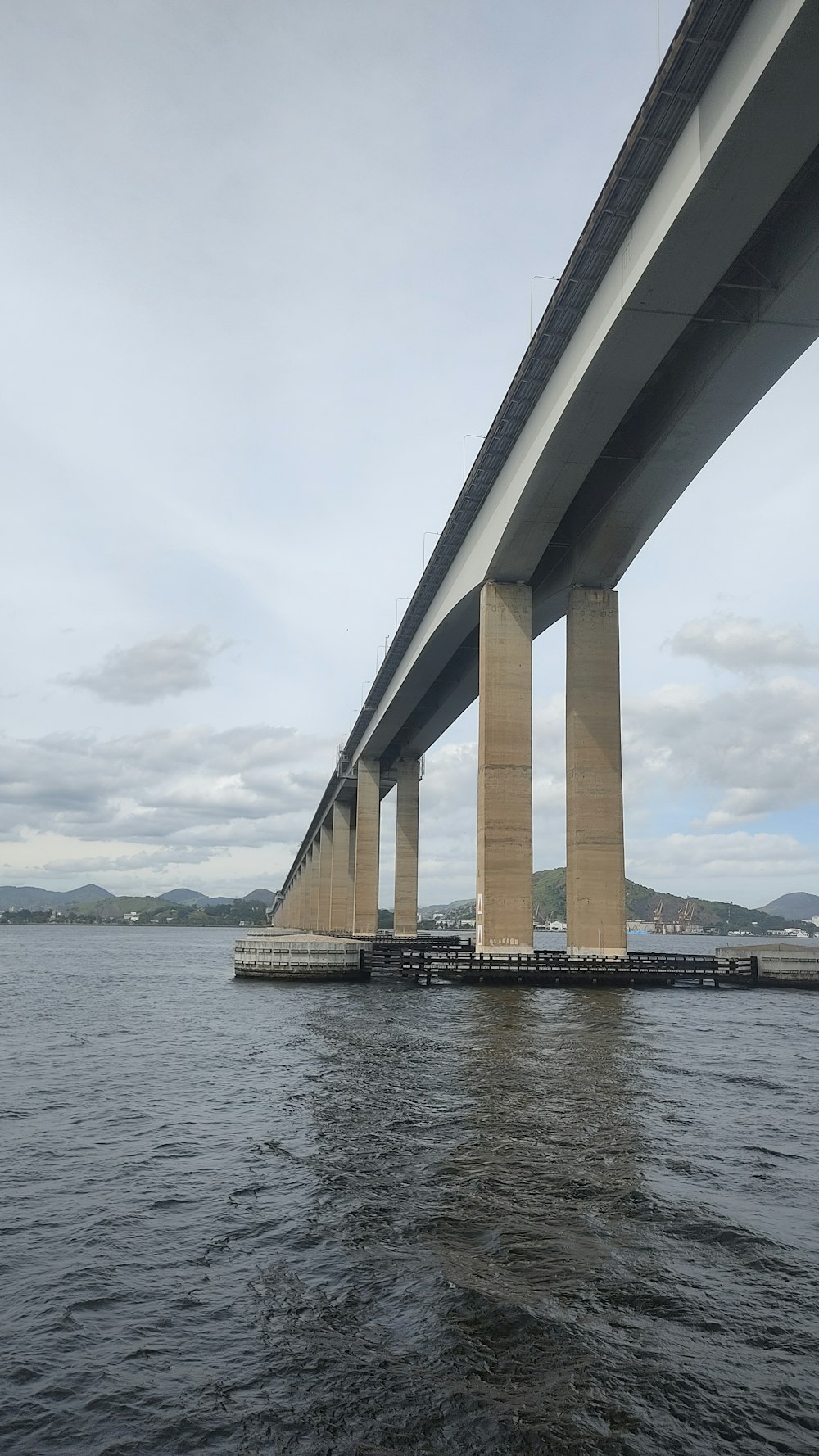 a large bridge spanning over a large body of water