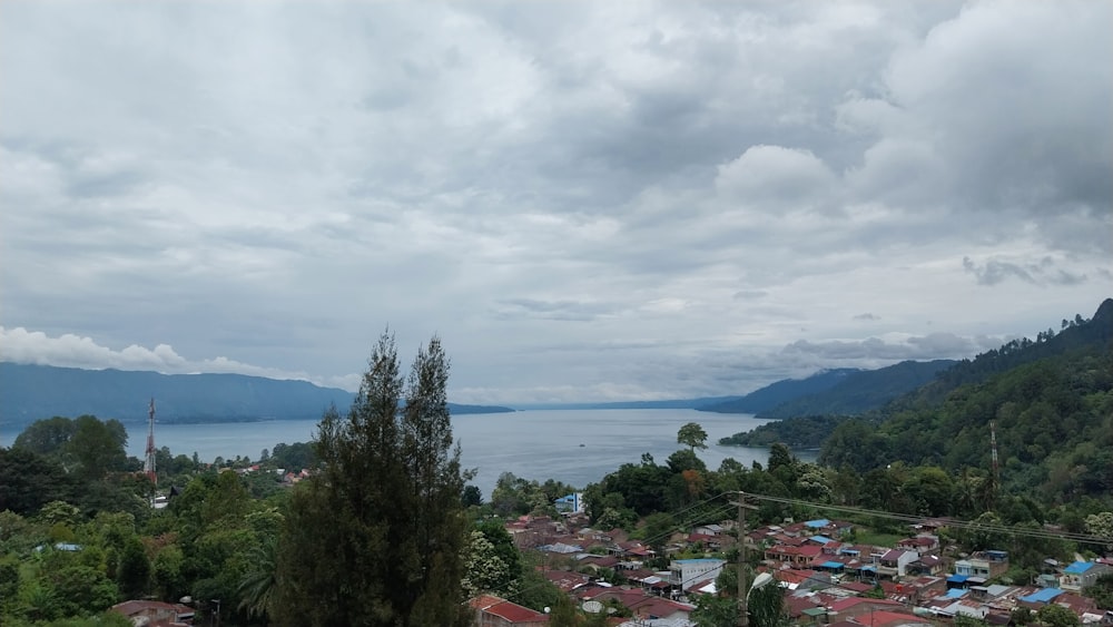 a view of a village and a body of water