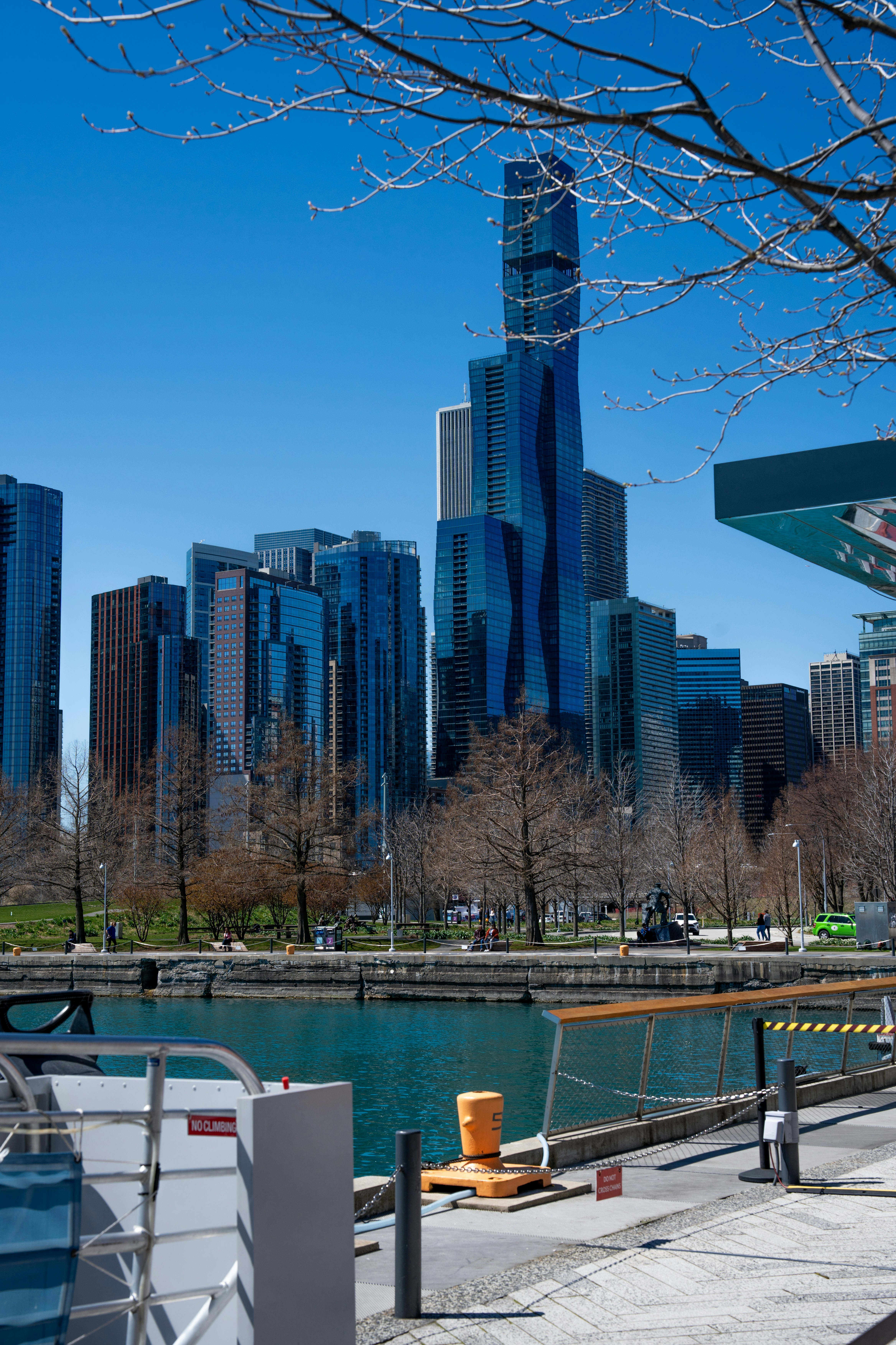 a large body of water with a city in the background