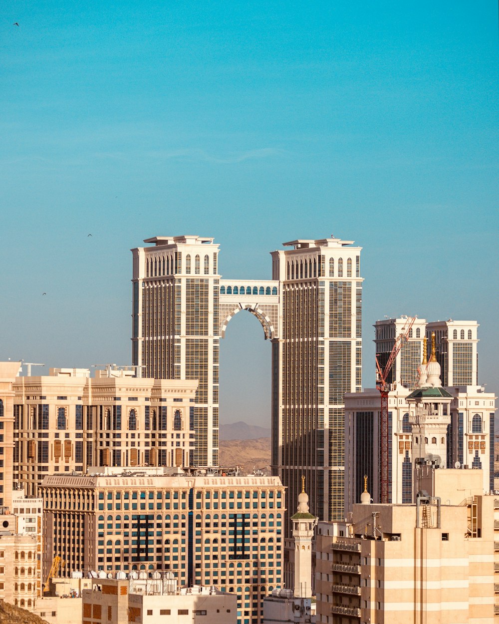 a view of a city with tall buildings