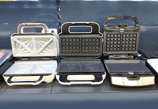 a couple of panini's sitting on top of a table