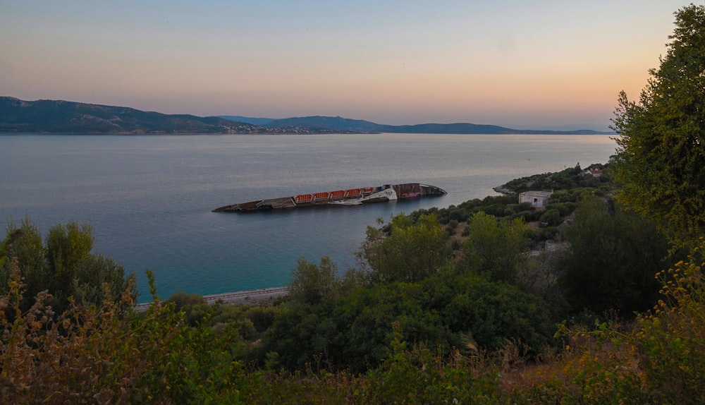 a large ship sitting on top of a large body of water