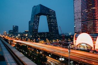 a very tall building in the middle of a city