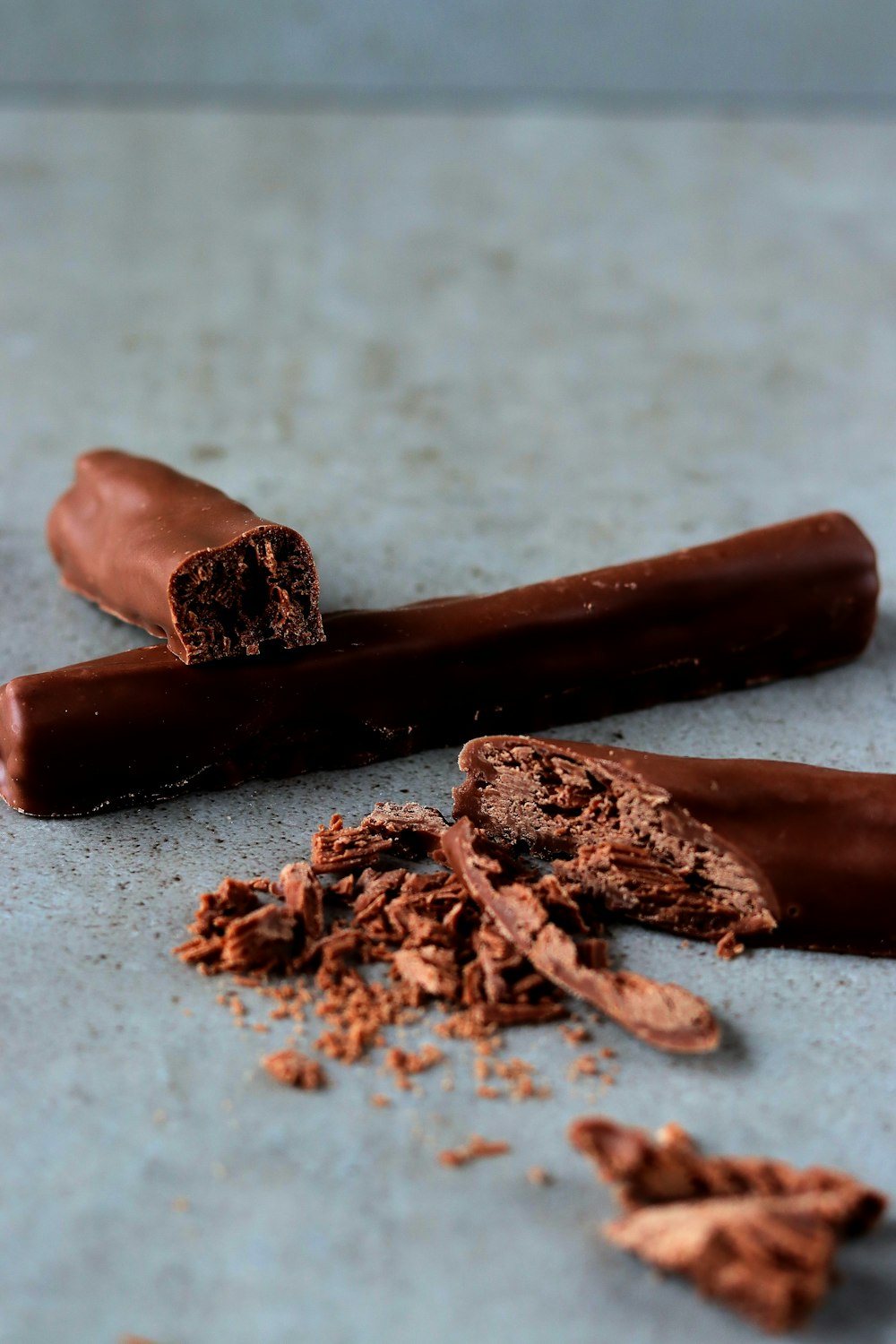 a couple of pieces of chocolate sitting on top of a counter